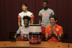 Edgewater and Boone athletes share a laugh recalling past years games. The goal of the Summit was achieved bringing together te two sides reminding them that a rivalry between schools shouldn't burn the bridge of friendship between students.