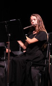 IN CONCERT C. Flutist Elena Berisha, sophomore, performs in The Veteran's Day Concert. photo/MEGAN DEMPSEY