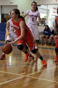 LOOKING TO ATTACK. Emily Colvin, searching for a Lake Highland weakness, brings the ball forward. photo/ AMELIA CHEATHAM