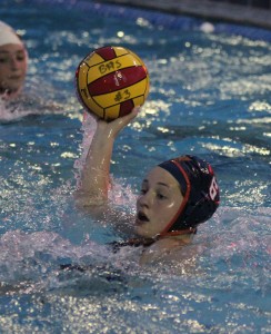 PASS.  On March 4, Camille Rimmer looks for an open teammate.  photo/ Diana Bronson