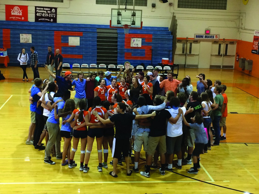 After a comeback Lady Braves and the rowdy crowd gather to sing the alma mater. photo/ Grace Asbury