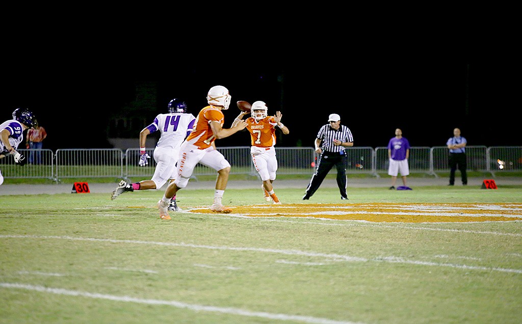 ON THE RUN. Thomas Verzi III pulls Noah Chevalier out wide for a pass.