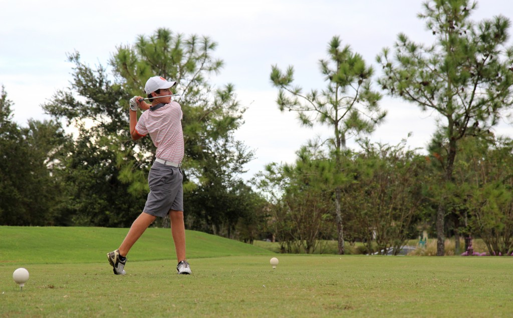 FOUR. Sophomore Nick Bessire tees off the third hole. photo/grace asbury