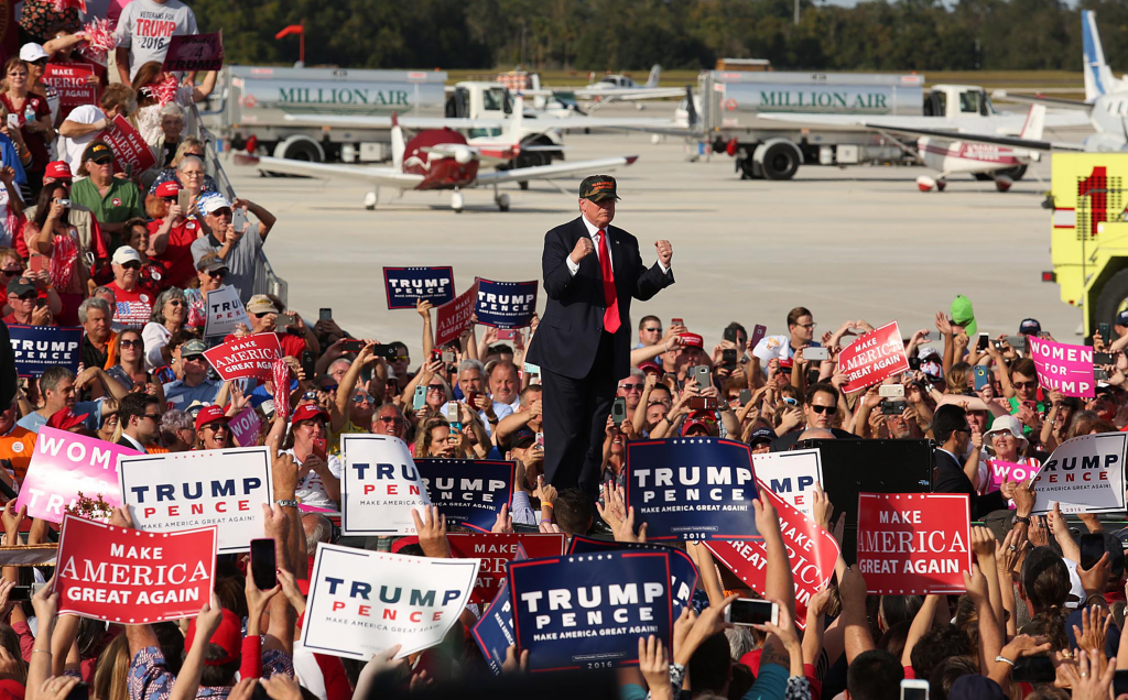 Donald Trump arrives at a Trump rally at Sanford Orlando International Airport on Oct. 25, 2016 in Sanford, Fla. Photo/Stephen M. Dowell