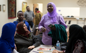Asma Ali speaks with other women during a discussion of issues related to Islamphobia and the election of Donald Trump on Saturday, Nov 12, 2016 in Cedar Rapids, Iowa. The Islamic Center of Cedar Rapids hosted the community potluck and discussion. (John Richard/Los Angeles Times/TNS)
