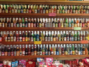 Rocket Fizz's display wall hosts some of their dozens of unique soda flavors.