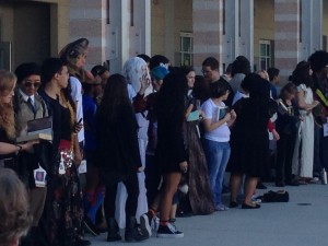 PHOTO/ Madison Steffey Students line up to be judged in the courtyard on Literary Character Day. The large turnout was evidence of the event’s growing popularity. 