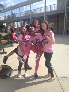 NHS members sell Scare Away Cancer T-Shirts during breast cancer awareness month