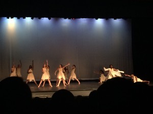 Students perform dance number in end-of-year showcase. 