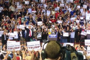 Supporters cheer at Orlando rally as Trump takes the podium in the CFE Arena at the University of Central Florida. (Photo courtesy of Saul Saenz)